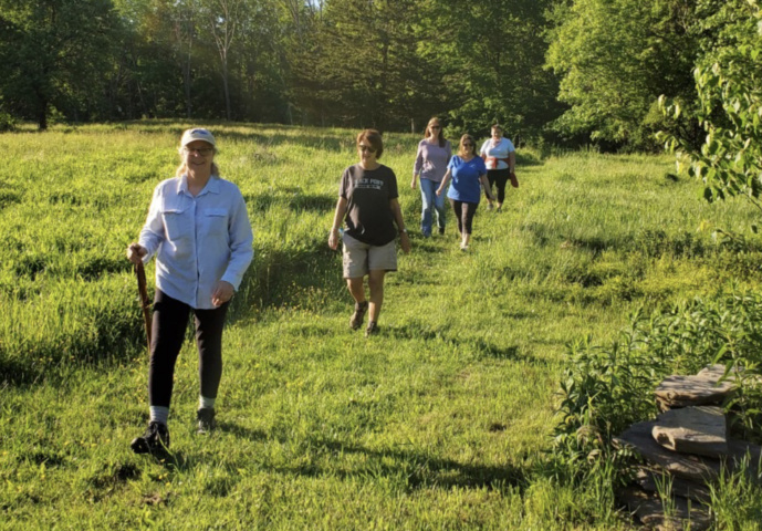 people walking in field